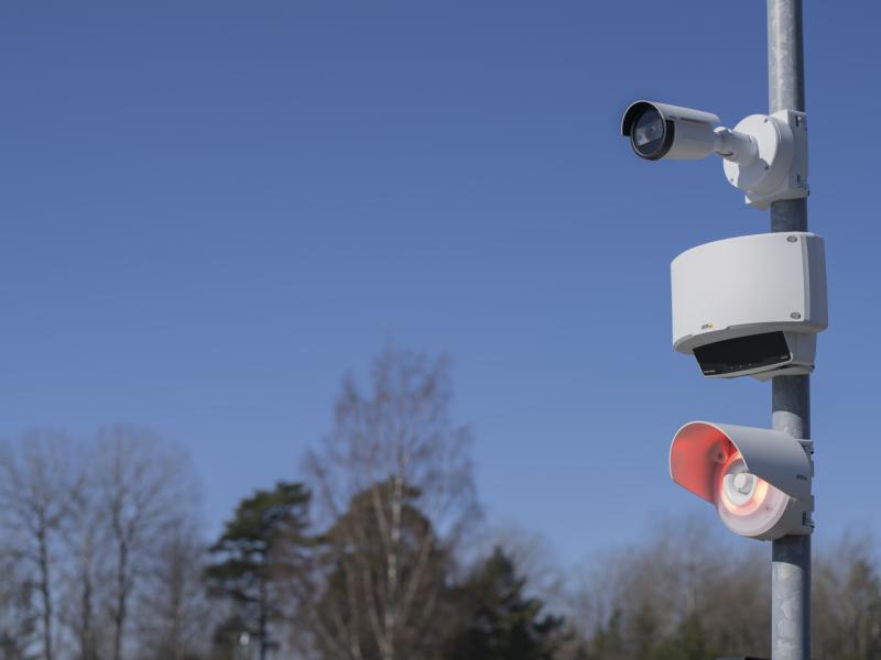 Bullet camera, Axis radar and network strobe siren with strobe siren showing red light